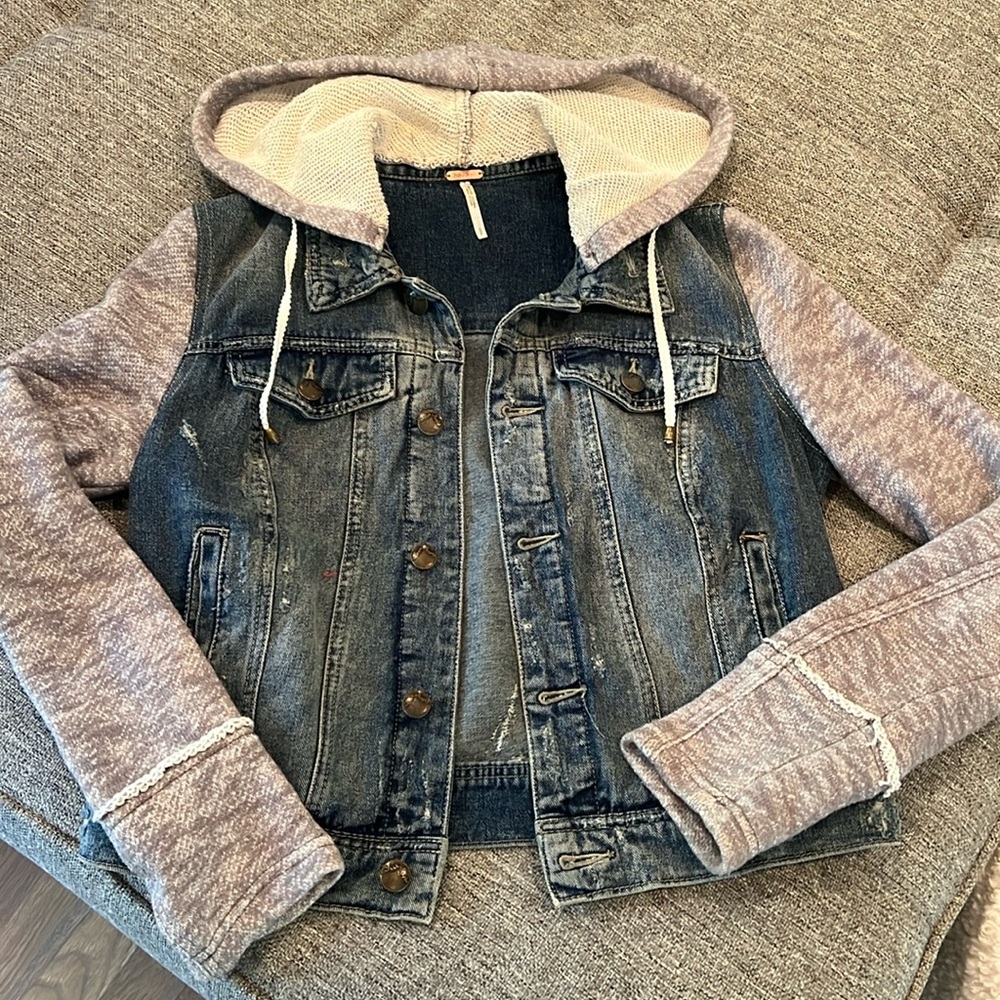 Free People distressed denim and knit hooded jacket.
